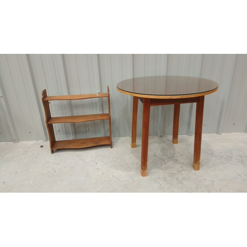 46 - Mid-century wooden circular side table with a polished veneer top and sturdy tapered legs. Structura... 