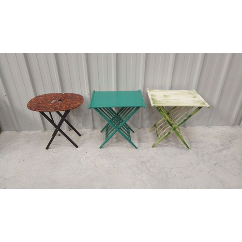 47 - Three vintage folding tables feature faux tortoiseshell, green, and bamboo-style designs.