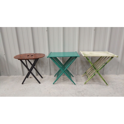 47 - Three vintage folding tables feature faux tortoiseshell, green, and bamboo-style designs.