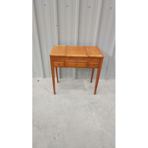 48 - Antique wooden vanity table, from the early 20th century, featuring a distressed mirrored centerpiec... 