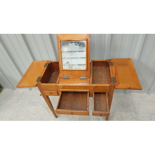 48 - Antique wooden vanity table, from the early 20th century, featuring a distressed mirrored centerpiec... 