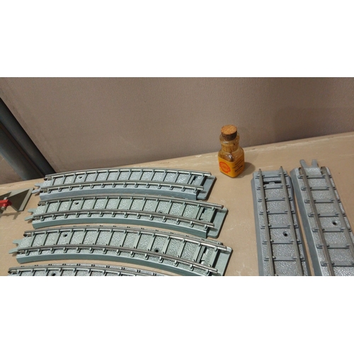 52 - Vintage model railway track collection, including straight and curved sections with connectors and a... 