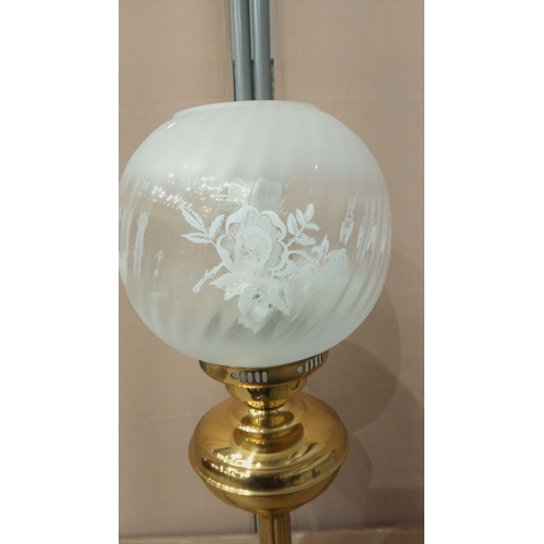 33 - Vintage brass table lamp with frosted glass globe shade, elegant etching details, and classic design... 