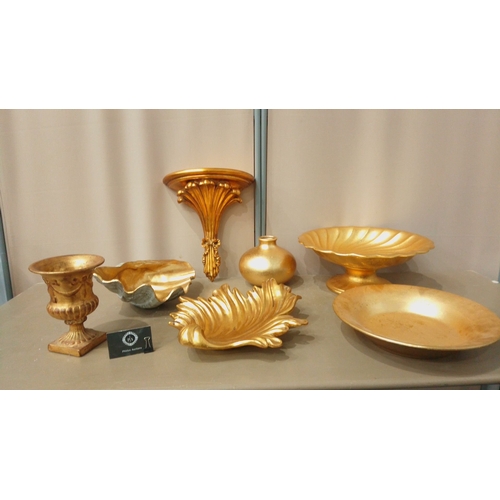 36 - Assorted gilded decor lot features wall shelf, urn, leaf dish, vase, pedestal bowl, and platter. Ele... 