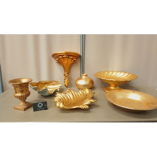 36 - Assorted gilded decor lot features wall shelf, urn, leaf dish, vase, pedestal bowl, and platter. Ele... 