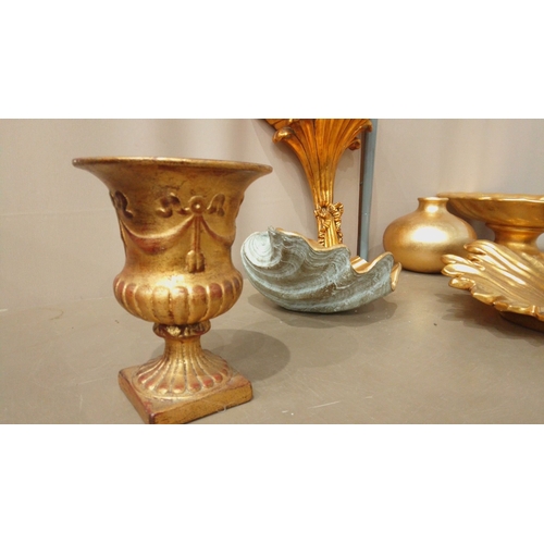 36 - Assorted gilded decor lot features wall shelf, urn, leaf dish, vase, pedestal bowl, and platter. Ele... 