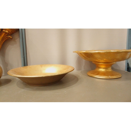 36 - Assorted gilded decor lot features wall shelf, urn, leaf dish, vase, pedestal bowl, and platter. Ele... 