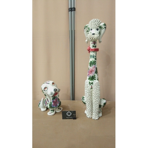 42 - Pair of ceramic dog figurines, hand-painted with floral motifs. Featuring intricate textures and vib... 