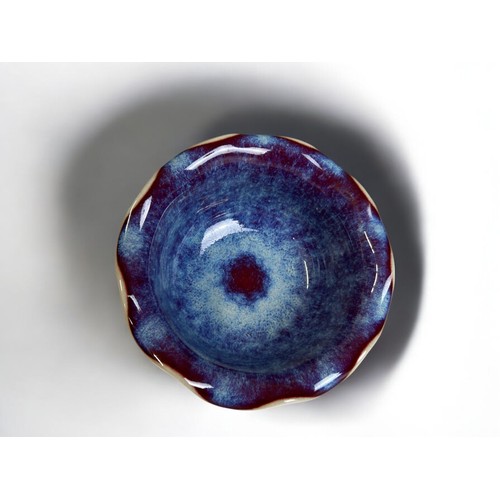 10 - A Chinese Jun style porcelain bowl.20th century.Flambe purple glaze. Four character marks to base.8 ... 