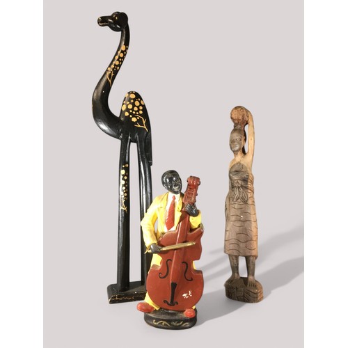 92 - Retro Ceramic Jazz Musician Playing Double Bass. Carved Floor Standing Giraffe and an African Carved... 