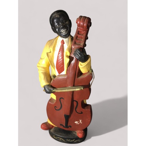 92 - Retro Ceramic Jazz Musician Playing Double Bass. Carved Floor Standing Giraffe and an African Carved... 