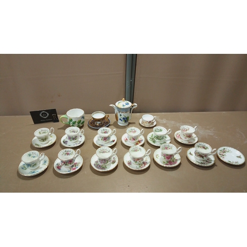 105 - Set of Monthly Floral Bone China Teacups and Saucers: Beautifully adorned Royal Albert designs for e... 