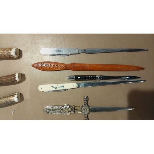 111 - Set of antler-handled steak knives and forks, paired with vintage letter openers, including carved w... 