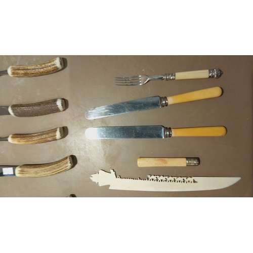 111 - Set of antler-handled steak knives and forks, paired with vintage letter openers, including carved w... 