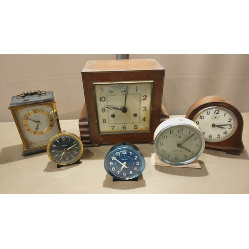 120 - A Large Lot of vintage mantel clocks: an Art Deco wood-cased clock with chiming movement, plus a sma... 