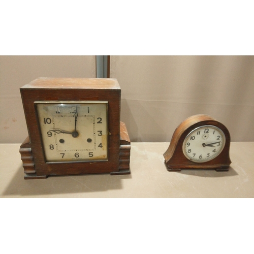 120 - A Large Lot of vintage mantel clocks: an Art Deco wood-cased clock with chiming movement, plus a sma... 