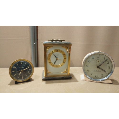 120 - A Large Lot of vintage mantel clocks: an Art Deco wood-cased clock with chiming movement, plus a sma... 