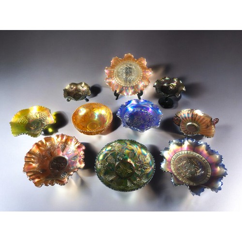 90C - A Fine Selection of Iridescent Carnival Glass from Blue to Green, Amber to Amethyst. Varying Designs... 