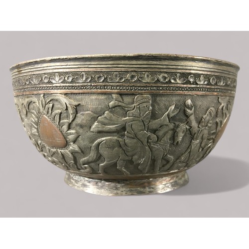 84 - 19th Century Persian Silvered Copper Bowl with Hunter and Mythical Beast Relief Decoration.