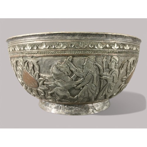 84 - 19th Century Persian Silvered Copper Bowl with Hunter and Mythical Beast Relief Decoration.