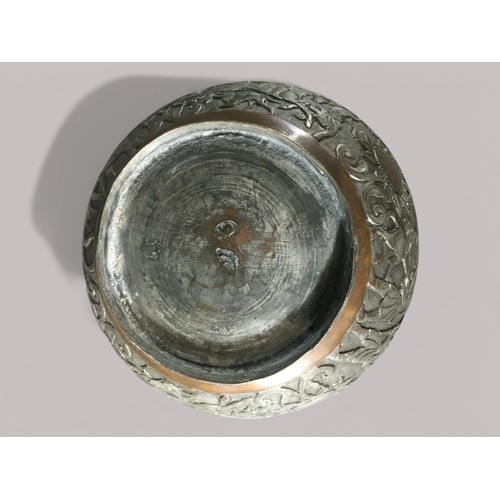 84 - 19th Century Persian Silvered Copper Bowl with Hunter and Mythical Beast Relief Decoration.