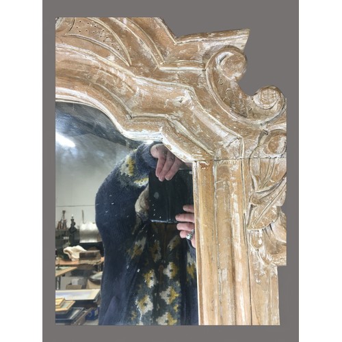 351 - Large Carved  Stripped Pine and Washed Mirror having Scroll and Leaf Carved Decoration.H 120cm x 73c... 