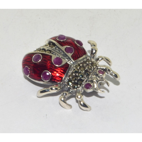 43 - Silver and Enamel ladybird brooch with ruby eyes