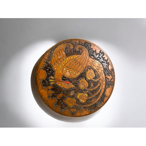 38 - An Oriental hand carved wooden box.The lid carved & painted with a Ho Ho bird.8 x 15cm... 