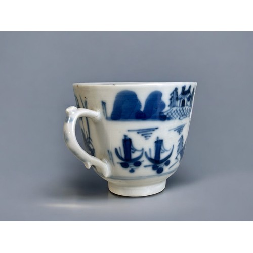 34 - An 18th Century Chinese export blue & white porcelain tea cup.'Two Pagoda's' design, with scroll... 