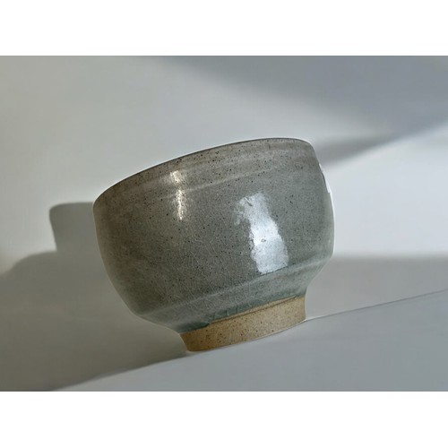 9 - A Chinese export Jun ware type celadon rice bowl and a crackle ground bowl.