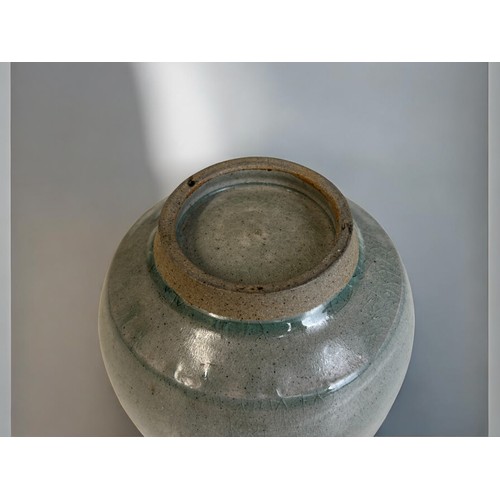 9 - A Chinese export Jun ware type celadon rice bowl and a crackle ground bowl.