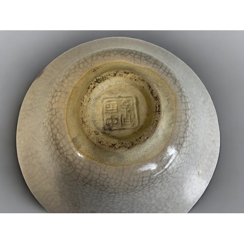 9 - A Chinese export Jun ware type celadon rice bowl and a crackle ground bowl.