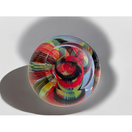 37 - A collection of twelve glass paperweights.