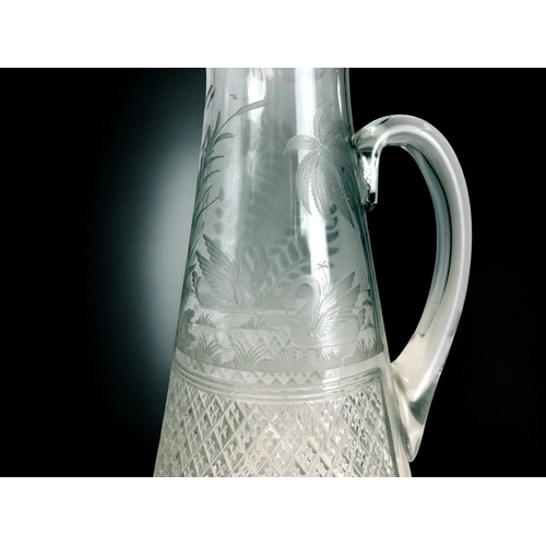 15 - A 19th century crystal engraved claret jug.Attributed to Wilhelm Fritsche for Thomas Webb.Double dia... 