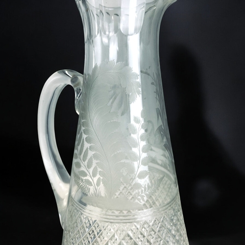 15 - A 19th century crystal engraved claret jug.Attributed to Wilhelm Fritsche for Thomas Webb.Double dia... 