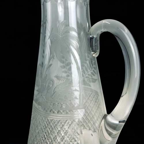 15 - A 19th century crystal engraved claret jug.Attributed to Wilhelm Fritsche for Thomas Webb.Double dia... 