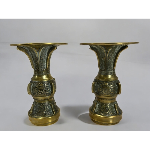 213 - A pair of Chinese Archaistic bronze Gu form vases.Qing dynasty, 19th century.Height - 14cm... 