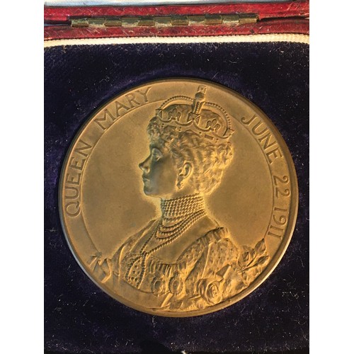 223 - A cased bronze official George V coronation medal.Together with two bronze Edward VII coronation med... 