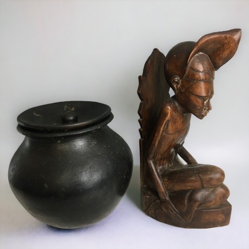 364 - Tumi African Earthen Ware Cooking Vessel and a Carved Hardwood Statuette of a seated Woman.