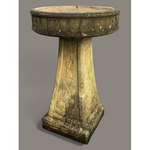 405 - Attractive and well weathered reconstituted Stone Bird Bath with Vine and Bird Decoration.H 63cm.... 