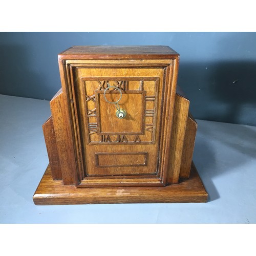 181 - Vintage Schatz Glass Dome Teal Clock and an Art Deco Wooden Clock.