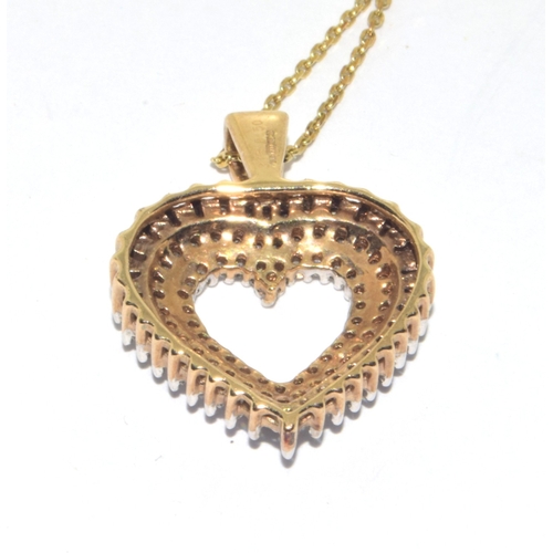 8 - 9ct gold ladies vari cut Diamond pendant necklace on a 9ct gold chain of 42cm