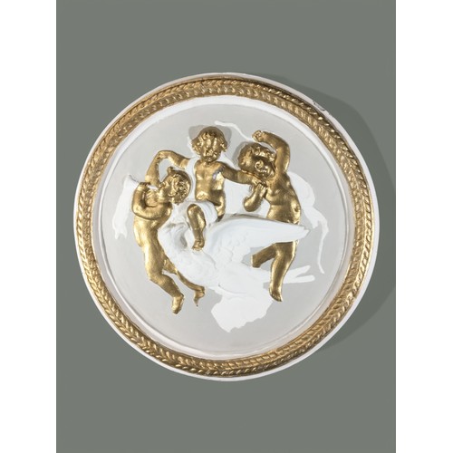 341 - Plaster of Paris Panel in the Venetian Style Depicting Cherubs and an Eagle.Dia 55cm