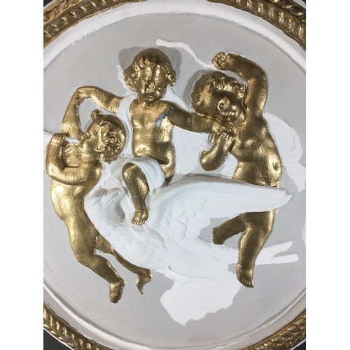 341 - Plaster of Paris Panel in the Venetian Style Depicting Cherubs and an Eagle.Dia 55cm