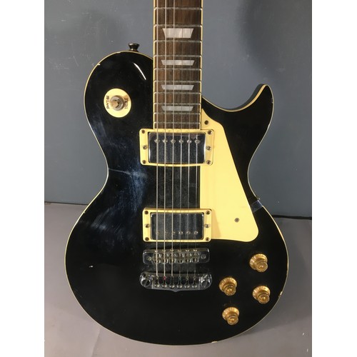 373 - Aria Electric Guitar, Black Cream and Gold. Comes with Carry Case.