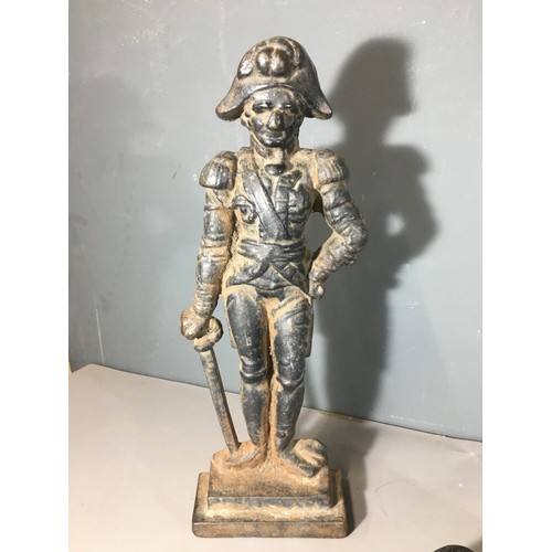 371 - Lord Nelson Cast Iron Door Stop, an Eastern Carved Sword and a Wrought Iron Fire Companion Set.