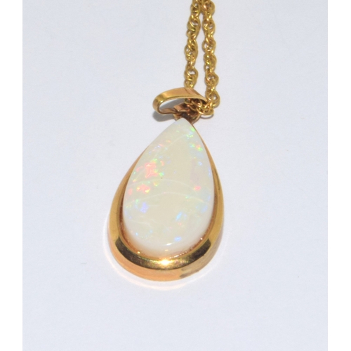 103 - Large 9ct gold opal tear drop pendant necklace on a 44cm 9ct gold chain