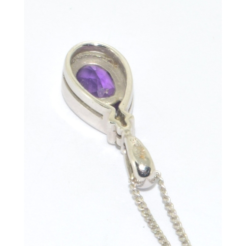 113 - 9ct white gold Amethyst pendant necklace with matching 9ct white gold ear studs on a 44cm 9ct white ... 