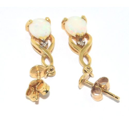 143 - 9ct gold Opal drop stud earrings 