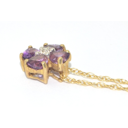 23 - 9ct gold ladies Amethyst and Diamond cluster pendant necklace on a 42cm 9ct gold chain